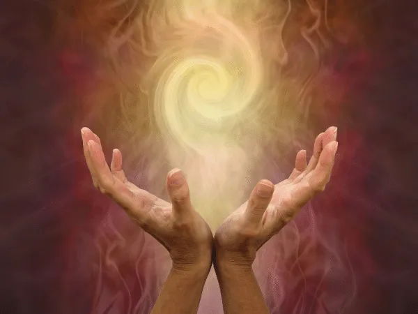 Mani rivolte verso l’alto che richiamano il significato del prano nella pranoterapia, simbolo dell’energia usata dal pranoterapeuta per curare con le mani.